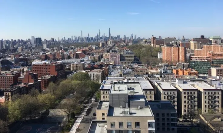 View from the rooftop of our CUNY site towards downtown Manhattan, showing the Harlem plain, Central Park, and skyscrapers off in the distance.